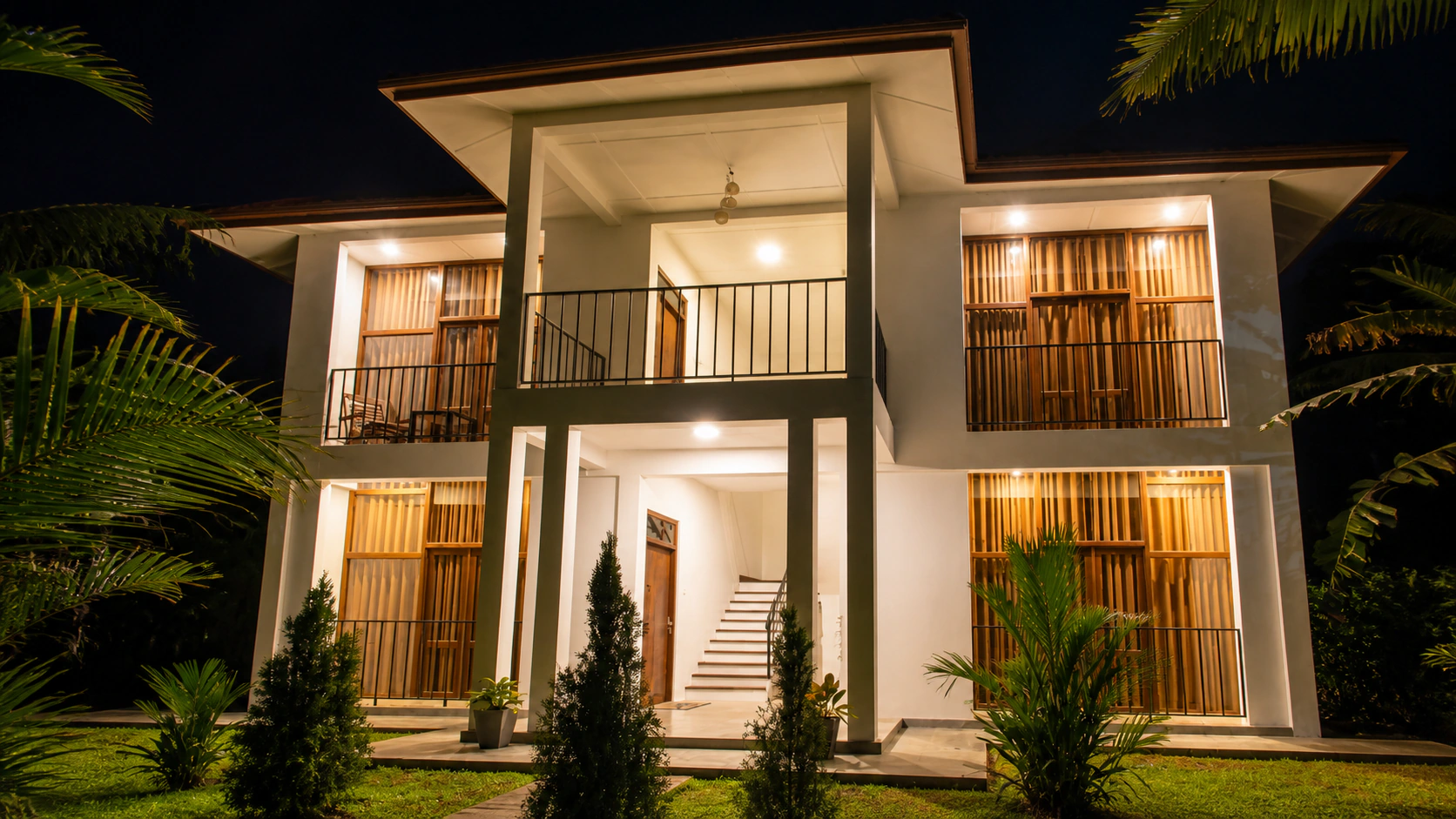 Manike Lodge warmly lit in the evening